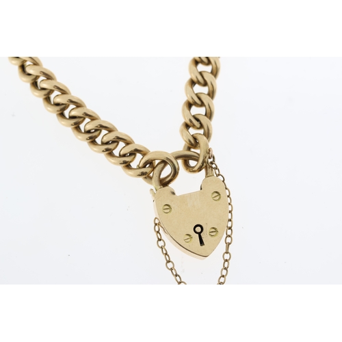 1003 - 15ct Yellow gold  padlock curb bracelet. 18g