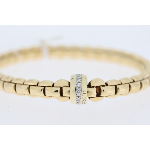 1005 - Fope 18ct yellow gold Eka Flex'It bracelet with 18ct white gold diamond set rondel. Total carat weig... 