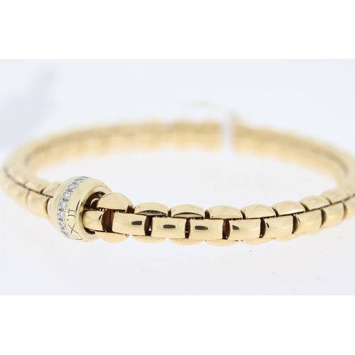 1005 - Fope 18ct yellow gold Eka Flex'It bracelet with 18ct white gold diamond set rondel. Total carat weig... 