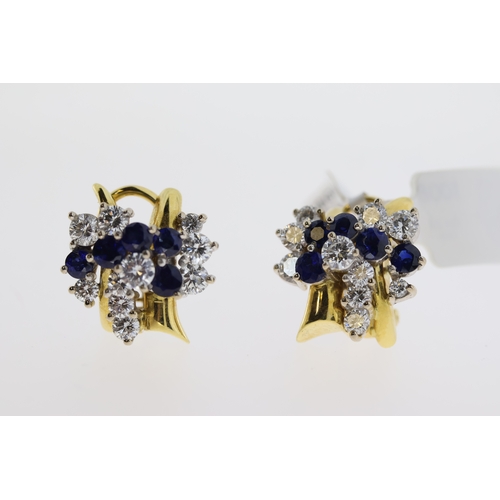 1008 - 18ct yellow gold blue gem stone and diamond earrings.  Round brilliant diamonds totaling approx 0.90... 