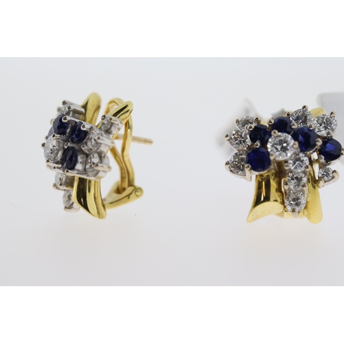 1008 - 18ct yellow gold blue gem stone and diamond earrings.  Round brilliant diamonds totaling approx 0.90... 