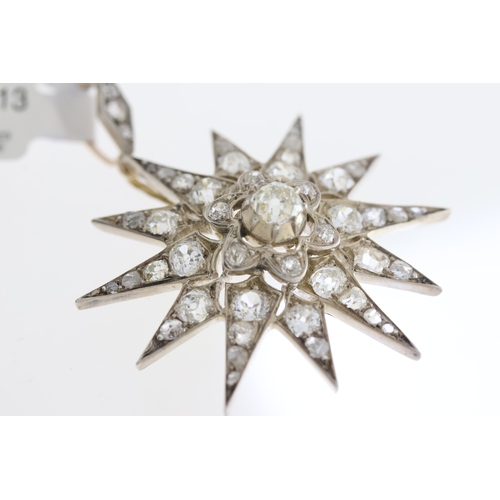 1013 - Edwadian white metal diamond star pendant. Old cut centre diamonds with rose cut diamonds. Total dia... 