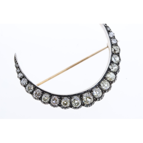 1016 - Victorian Crescent Brooch set with old mine cut diamonds. Total carat weight 2.50ct approximately. W... 