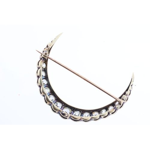 1016 - Victorian Crescent Brooch set with old mine cut diamonds. Total carat weight 2.50ct approximately. W... 