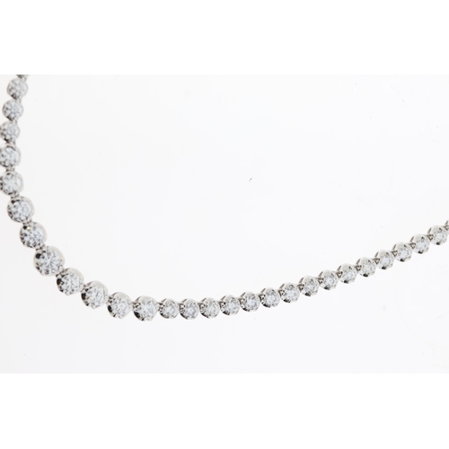 1020 - 7ct Diamond Necklace, 18ct white gold diamond set necklace. 109 claw set diamonds. 7.00ct total weig... 