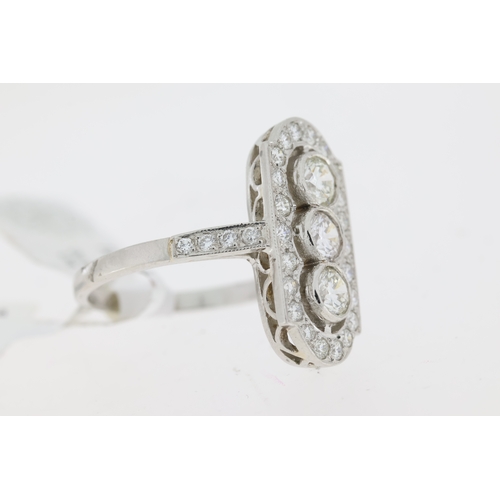 1024 - 1.30ct Diamond Panel Ring, Platinum 3 stone diamond cluster ring with diamond set shoulders.  Approx... 