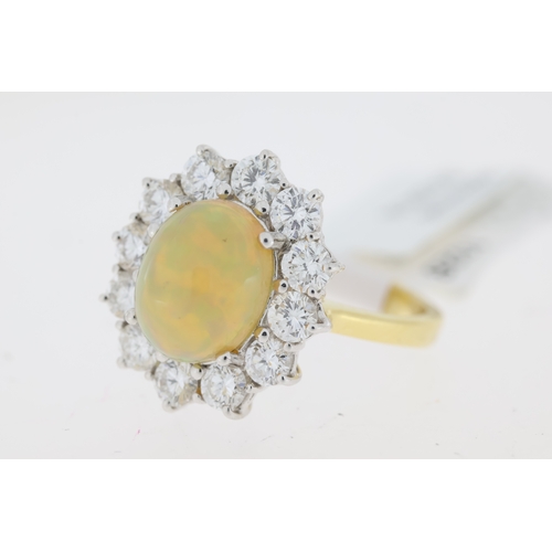 1028 - Opal and Diamond Cluster ring, 18ct yellow & white metal,  Oval opal centre and round brilliant diam... 