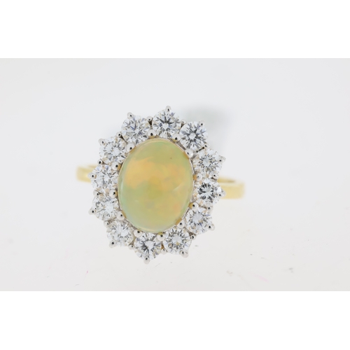 1028 - Opal and Diamond Cluster ring, 18ct yellow & white metal,  Oval opal centre and round brilliant diam... 