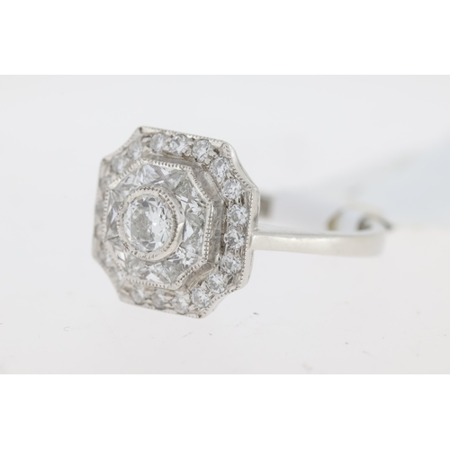 1036 - Platinum octagonal vintage inspired diamond ring. Centre rubover set old cut diamond 0.46ct. Rubover... 