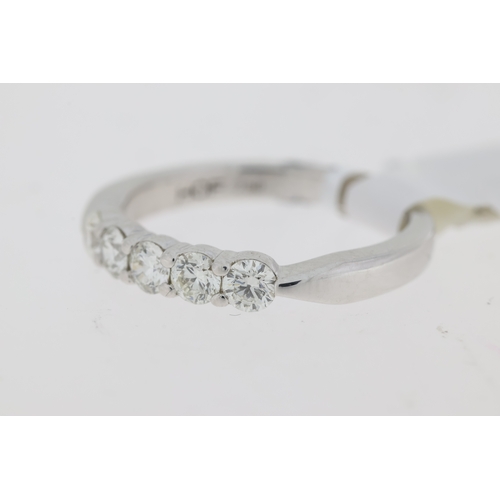 1038 - 18ct White gold diamond set half eternity ring., 5 stones, Diamond carat weight 0.47-0.55ct.