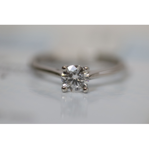 1042 - Platinum round brilliant cut diamond  0.51ct D colour and SI1 Clarity solitaire ring in 4 claw setti... 