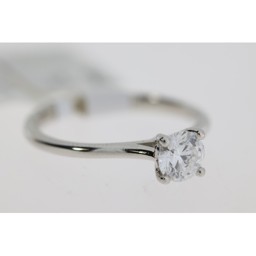 1042 - Platinum round brilliant cut diamond  0.51ct D colour and SI1 Clarity solitaire ring in 4 claw setti... 