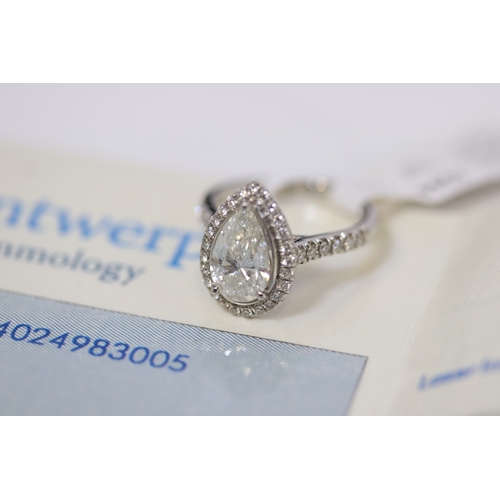 1044 - 1.80ct Platinum pear cut diamond solitaire ring with diamond halo and shoulders. Centre stone weight... 