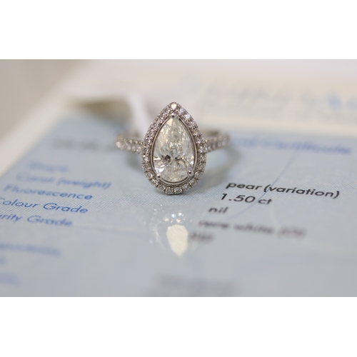 1044 - 1.80ct Platinum pear cut diamond solitaire ring with diamond halo and shoulders. Centre stone weight... 