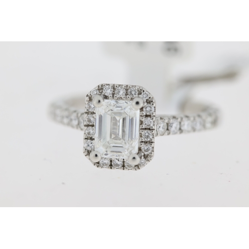 1046 - 1.01ct GIA F colour Emerald cut diamond ring with diamond set halo and shoulders. Emerald cut diamon... 