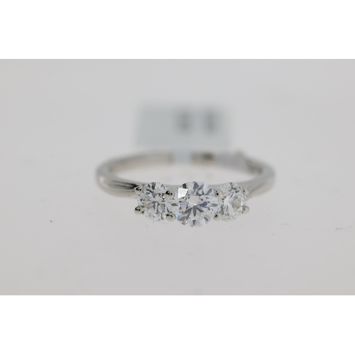 1047 - 0.81ct GIA Platinum Round Brilliant cut 3 stone diamond ring. Total diamond carat weight 0.81ct. Cen... 