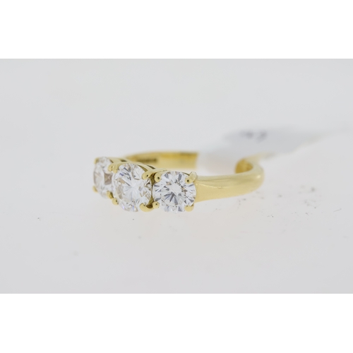 1048 - 1.74ct D/E - VS2Certified 3 Stone Ring, 18ct yellow gold brilliant cut diamond three stone claw set ... 