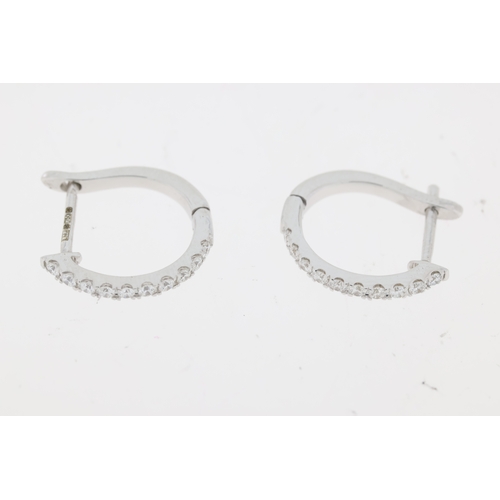 1054 - 18ct white gold brilliant cut diamond claw set hoop earrings. Approximate total diamond weight 0.20c... 