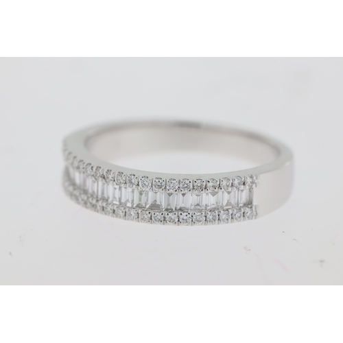 1055 - Platinum brilliant & baguette cut diamonds triple row claw set eternity ring. Approximate total diam... 