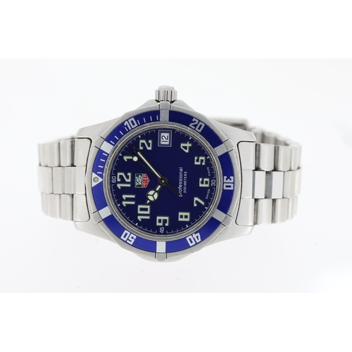 121 - TAG HEUER PROFESSIONAL QUARTZ REFERENCE WM1113, circular blue dial with arabic numeral hour markers,... 