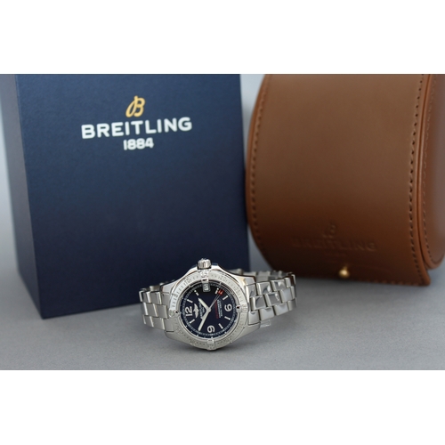 48 - LADIES BREITLING COLT OCEANE REFERENCE A77380 WITH BOX, circular black dial with baton and arabic nu... 