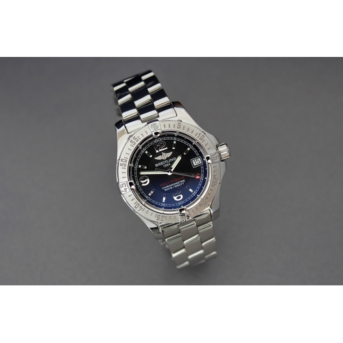 48 - LADIES BREITLING COLT OCEANE REFERENCE A77380 WITH BOX, circular black dial with baton and arabic nu... 