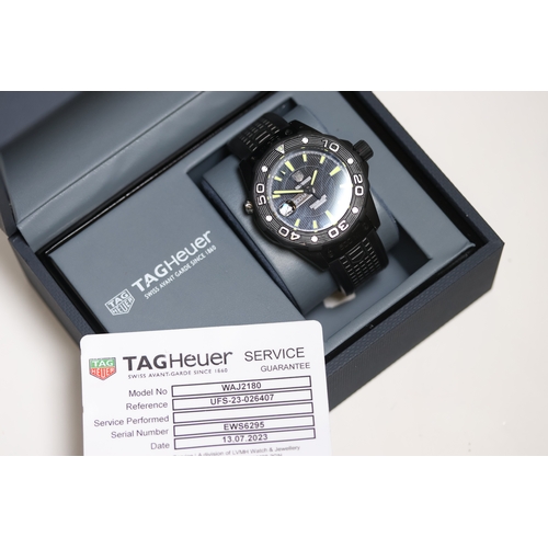 148 - TAG HEUER AQUARACER REFERENCE WAJ2180 WITH BOX AND RECENT SERVICE, circular black dial with floresce... 