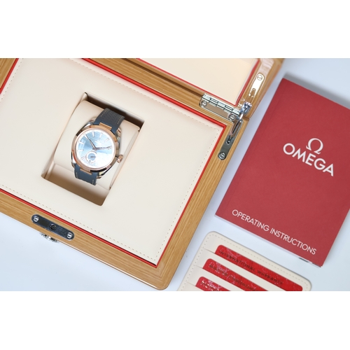 41 - OMEGA AQUA TERRA 150M STEEL AND SEDNA GOLD BOX AND PAPERS 2021, circular light sunburst blue dial wi... 