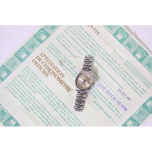 63 - LADIES ROLEX DATEJUST 26 REFERENCE 69174 WITH PAPERS 1988, circular silver dial with baton hour mark... 