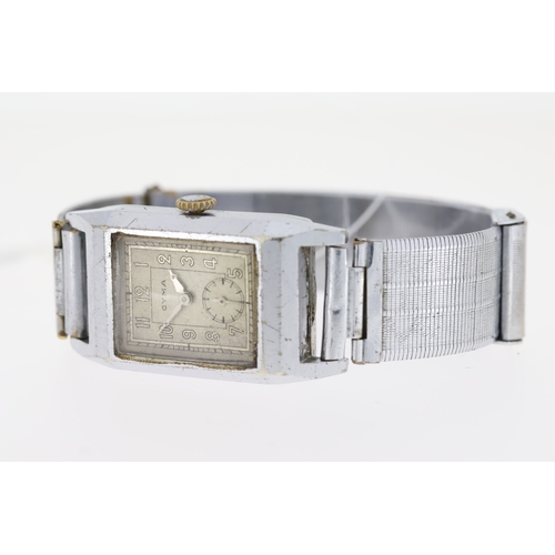 16 - Brand: Vintage Cyma
 Movement: Manual Wind
 Dial shape: Square
 Dial colour: Grey
 Dial features: Se... 