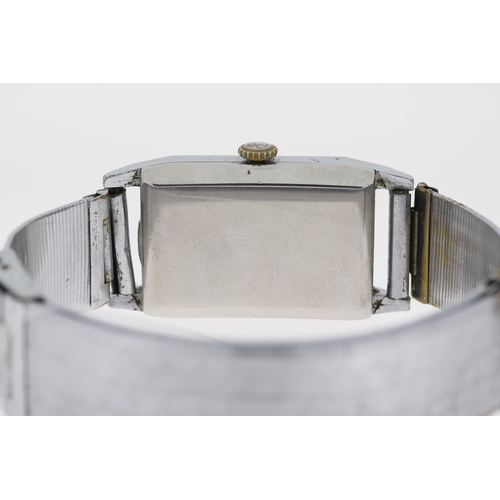 16 - Brand: Vintage Cyma
 Movement: Manual Wind
 Dial shape: Square
 Dial colour: Grey
 Dial features: Se... 