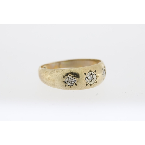 1003 - Hallmarked 375, diamond set gypsy ring.