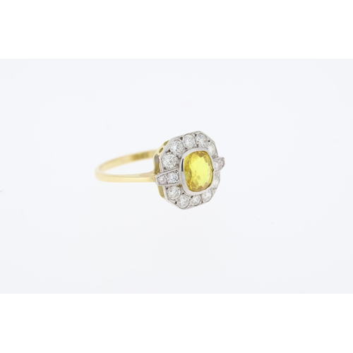 1005 - Yellow gold, yellow sapphire and diamond ring. (Yellow sapphire 1.40 carats, diamonds 0.55 carats in... 