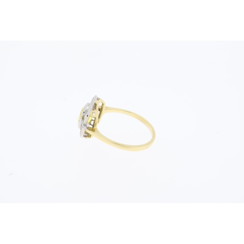 1005 - Yellow gold, yellow sapphire and diamond ring. (Yellow sapphire 1.40 carats, diamonds 0.55 carats in... 