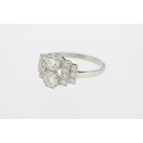 1009 - Platinum art deco style diamond dress ring. Estimated overall weight 0.90 carats.