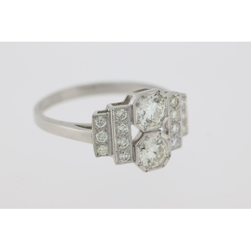 1009 - Platinum art deco style diamond dress ring. Estimated overall weight 0.90 carats.