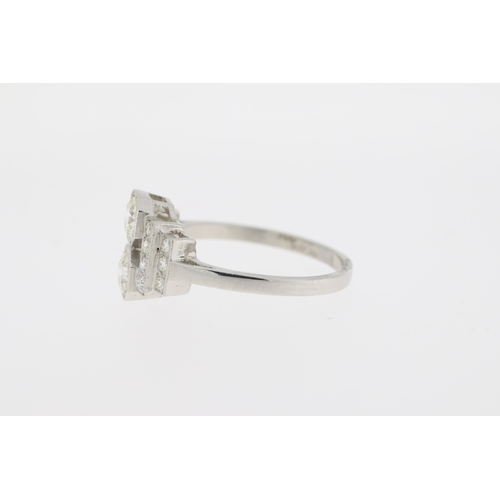 1009 - Platinum art deco style diamond dress ring. Estimated overall weight 0.90 carats.