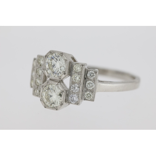 1009 - Platinum art deco style diamond dress ring. Estimated overall weight 0.90 carats.