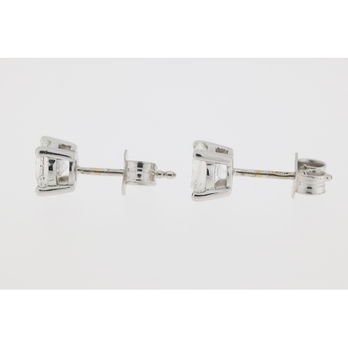 1011 - 18ct White gold, white sapphire earrings, total weight 1.85 carats.