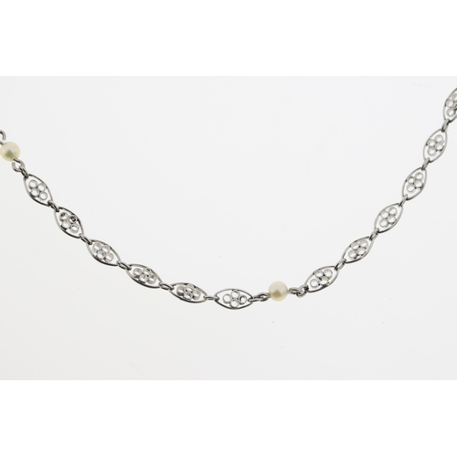 1012 - Circa 1920, A platinum and pearl chain 9 pearls. Chain length approx 50cm.