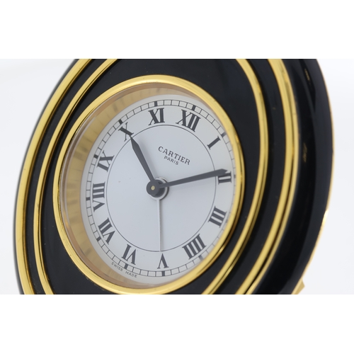 102 - Cartier mechanical desk/bedside alarm clock. Approx 83.5x99mm Comes with Cartier box and undated pap... 