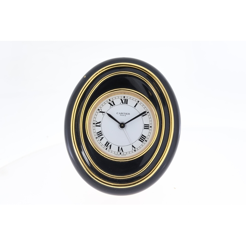 102 - Cartier mechanical desk/bedside alarm clock. Approx 83.5x99mm Comes with Cartier box and undated pap... 