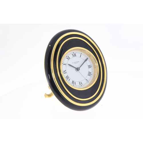 102 - Cartier mechanical desk/bedside alarm clock. Approx 83.5x99mm Comes with Cartier box and undated pap... 