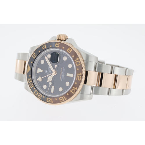 26 - Brand: Rolex
 Model Name: GMT Master II
 Reference: 126711CHNR 
 Movement: Automatic
 Box: Yes
 Pape... 