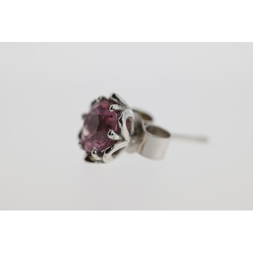 1013 - A pair of 9ct pink tourmaline stud earrings.