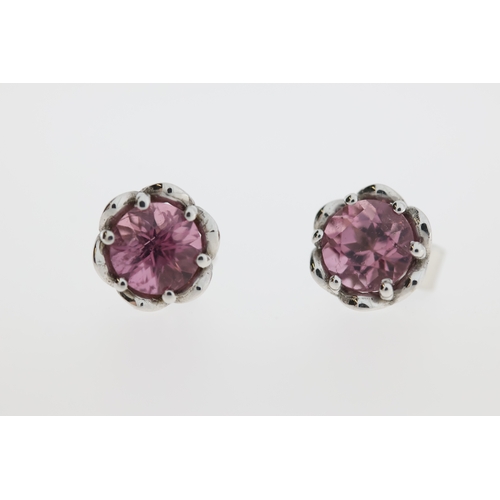 1013 - A pair of 9ct pink tourmaline stud earrings.