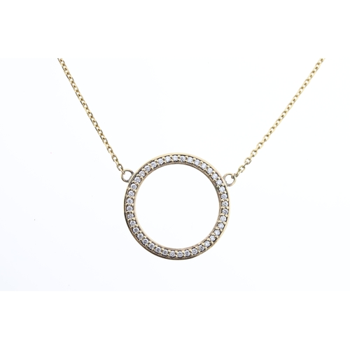 1015 - A 9ct diamond circle necklace.