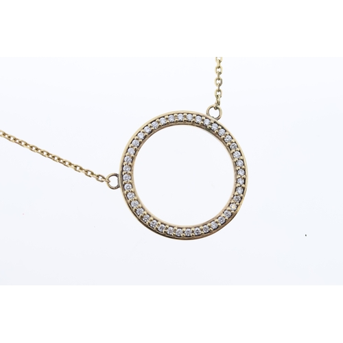 1015 - A 9ct diamond circle necklace.