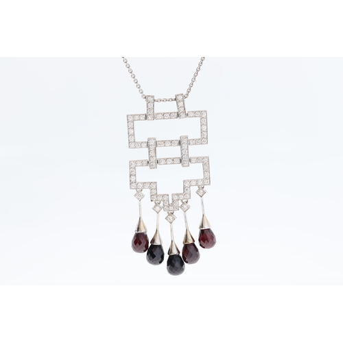 1017 - An 18ct diamond & garnet geometric necklace.