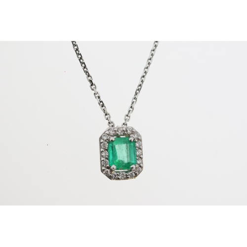 1018 - An 18ct emerald & diamond necklace.